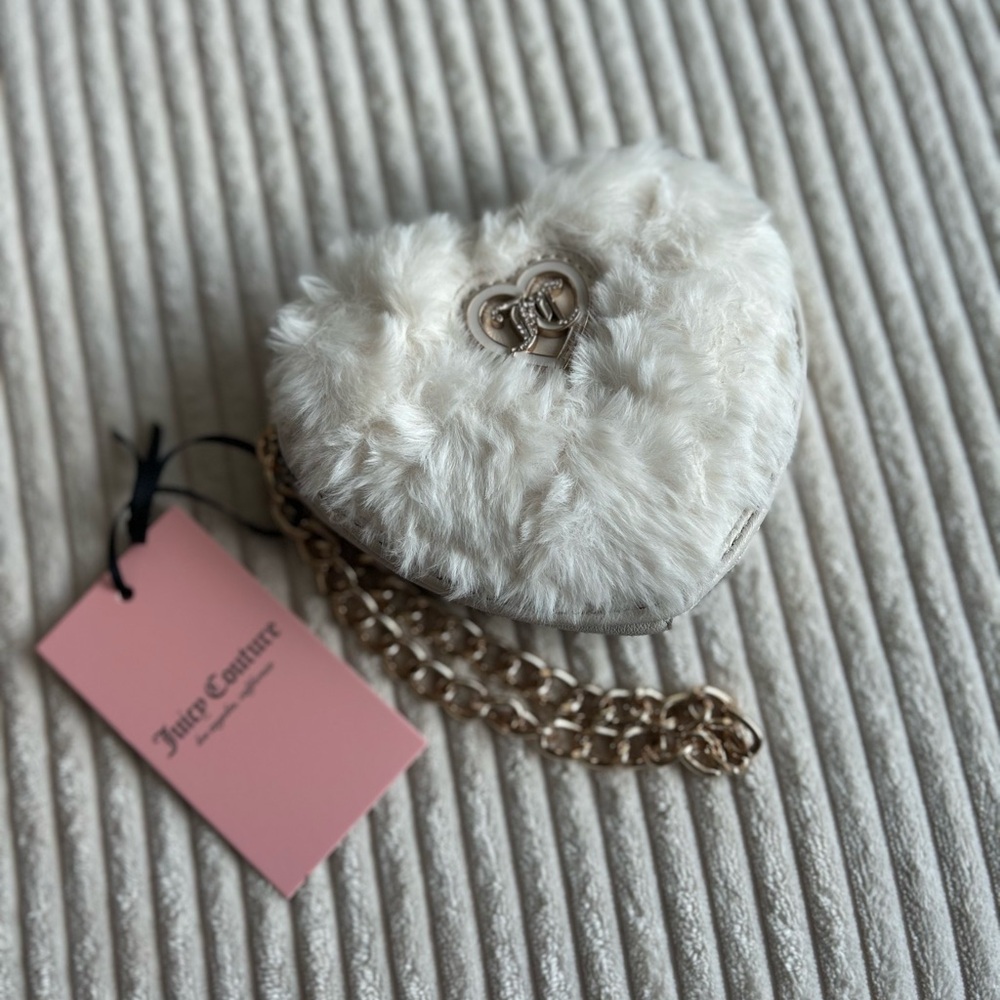 COPY - Juicy Couture Zip Around Wristlet- Angel. NWT.